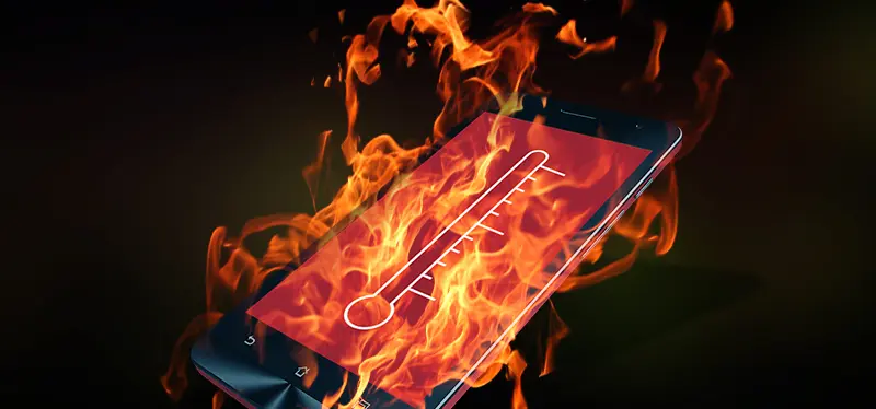 Celular envuelto en llamas simbolizando el sobrecalentamiento